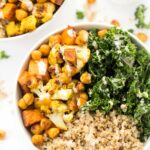 Curry Roasted Vegetable Quinoa bowls with cauliflower, sweet potatoes, chickpeas, kale and a creamy tahini dressing!