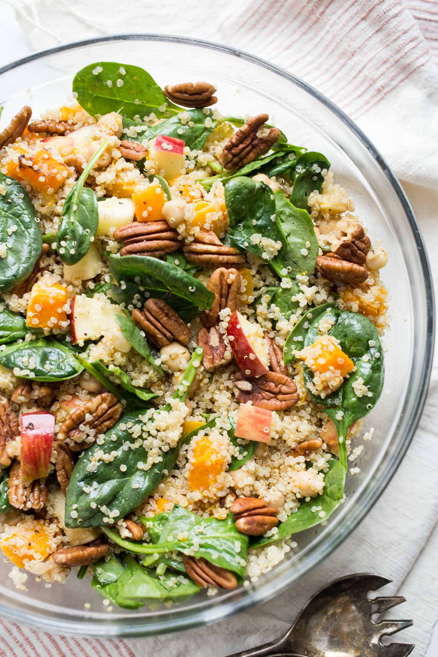 Butternut squash quinoa salad in a glass bowl