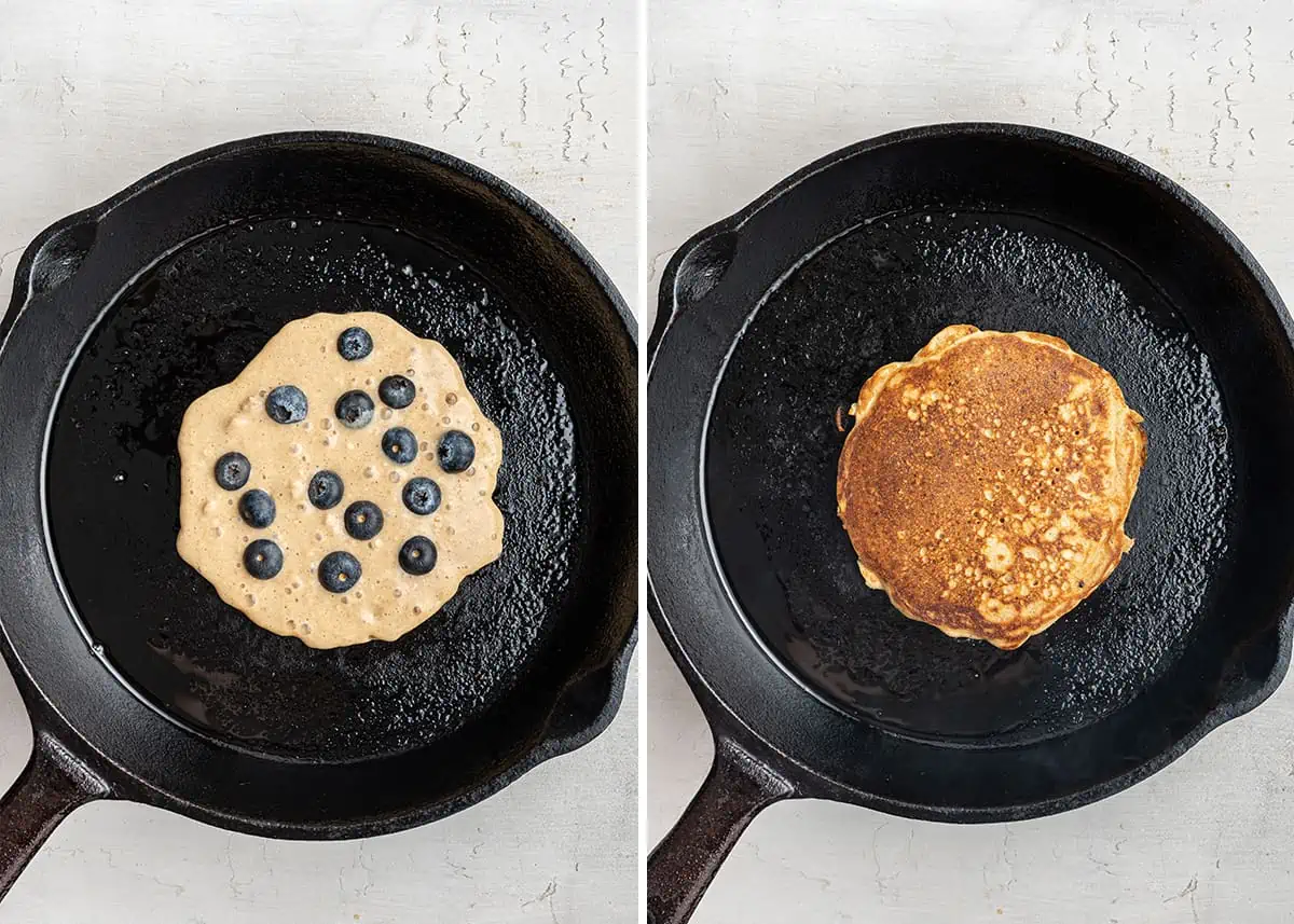 Side by side of an uncooked blueberry pancake in a past iron skillet, and a cooked blueberry pancake in a cast iron skillet