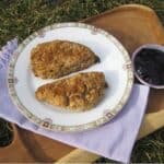 Plate of two mixed berry scones.