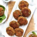 Overhead view of lentil patties served on a platter.