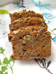 Three slices of carrot nut bread.