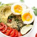 Mexican Quinoa Breakfast Bowls -- with tomato, avocado, soft boiled eggs and cilantro-lime quinoa!