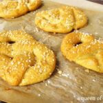 Homemade gluten-free soft pretzels on a tray.