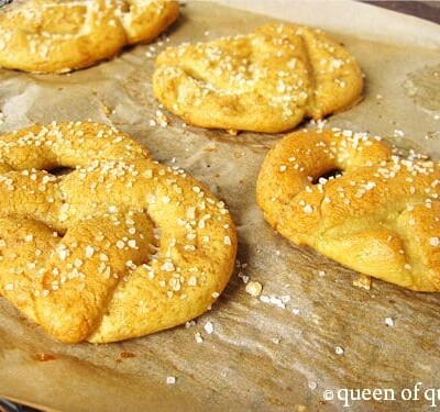 Homemade gluten-free soft pretzels on a tray.
