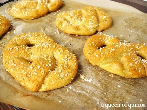 Homemade gluten-free soft pretzels on a tray.