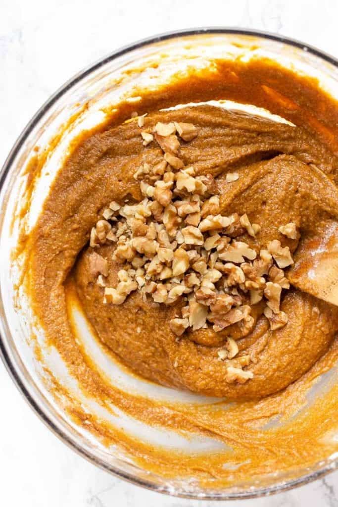 This soft, moist, flavorful gluten-free pumpkin bread recipe is a cozy fall breakfast! It's dairy-free, made with coconut flour in one bowl. Gluten-free pumpkin bread batter in a bowl.