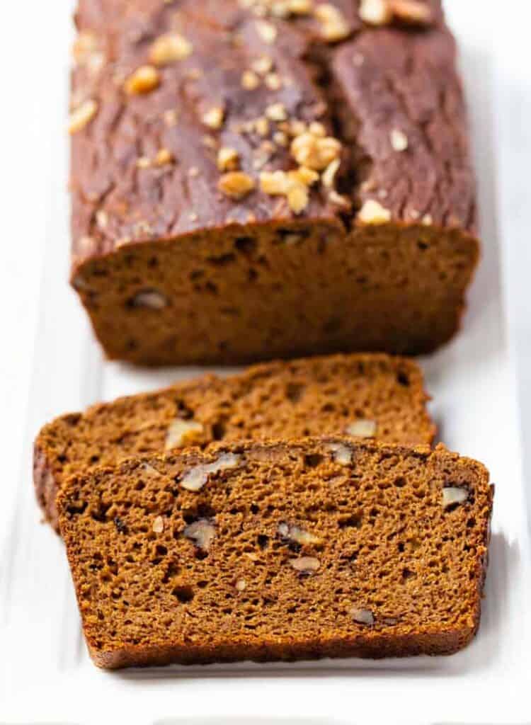 This soft, moist, flavorful gluten-free pumpkin bread recipe is a cozy fall breakfast! It's dairy-free, made with coconut flour in one bowl. Sliced gluten-free pumpkin bread made with coconut flour.