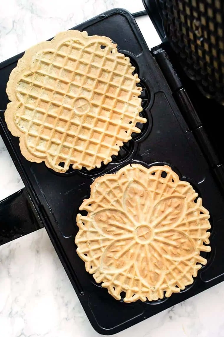 Pizzelles Cooking in Pizzelle Iron