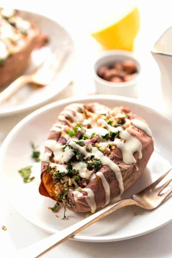 quinoa stuffed sweet potatoes with kale and tahini