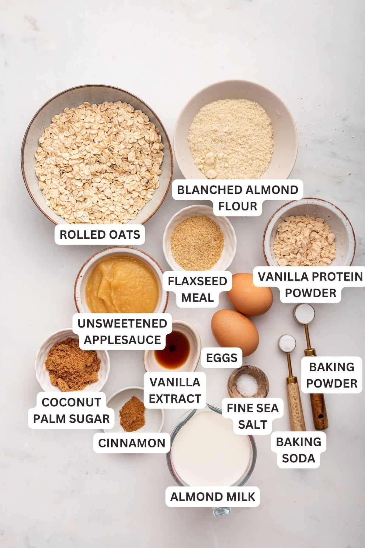 Overhead view of ingredients for oatmeal pancakes with labels