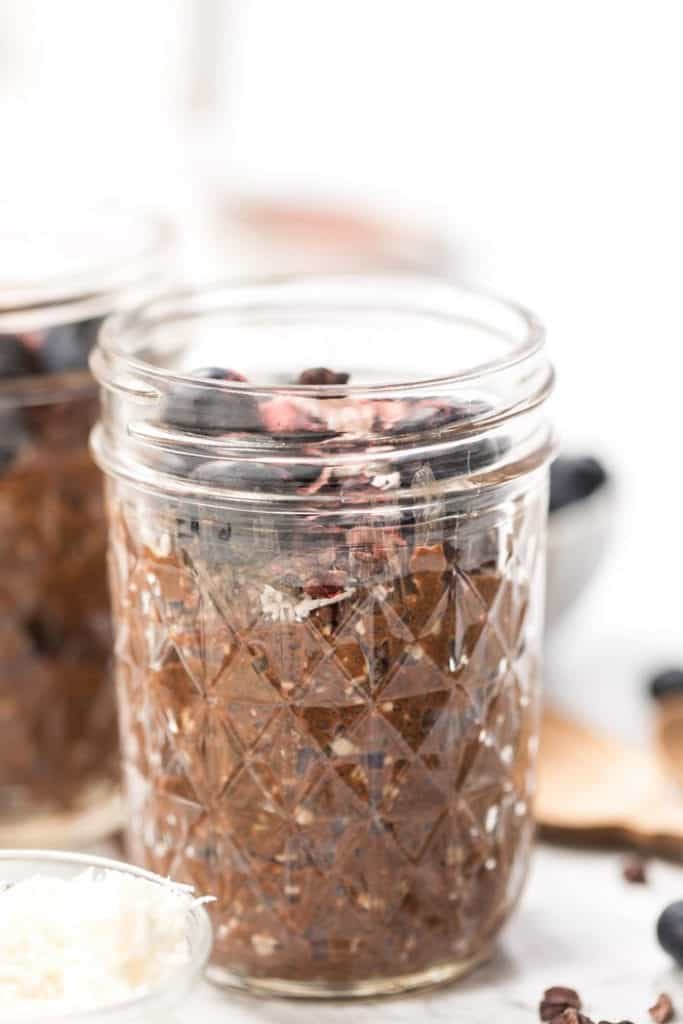 chocolate chia pudding with hemp seeds and blueberries