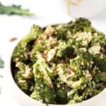 creamy vegan broccoli quinoa salad with sliced almonds