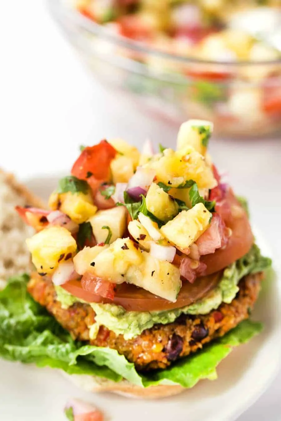 TEX MEX QUINOA BURGERS with corn, black beans and topped with a delicious pineapple salsa!