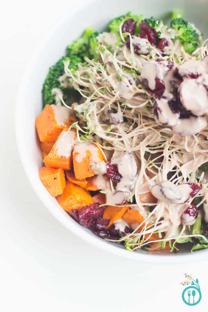 Autumn Quinoa Buddha Bowl Recipe drizzled with pomegranate dressing