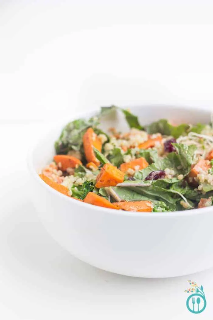 Autumn Quinoa Buddha Bowl Recipe drizzled with pomegranate dressing