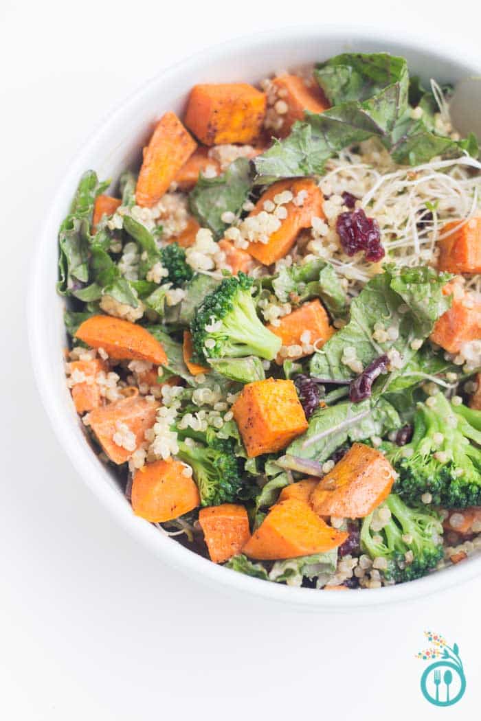 Autumn Quinoa Buddha Bowl Recipe drizzled with pomegranate dressing