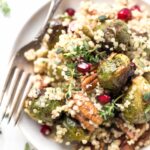 Roasted Brussels Sprout Quinoa Salad with pomegranates, pecans and a bright, tangy dressing!