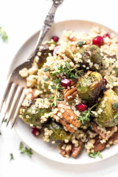 Roasted Brussels Sprout Quinoa Salad with pomegranates, pecans and a bright, tangy dressing!