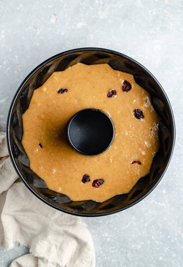 assembling a gluten free coffee cake made with almond flour