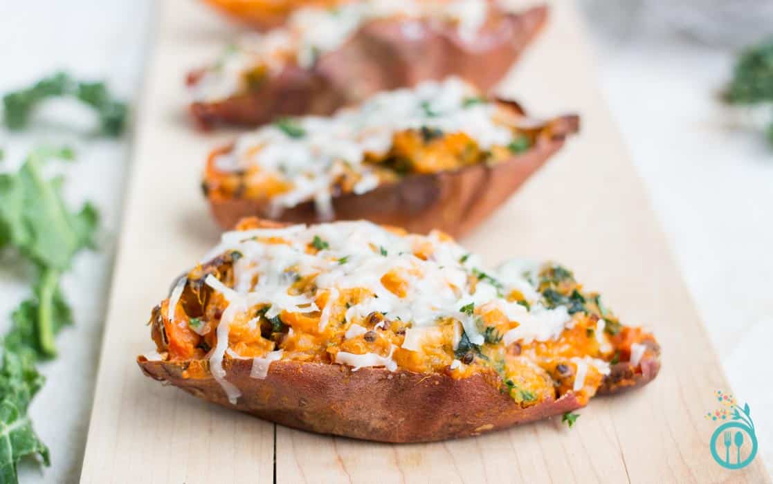 Healthy Loaded Sweet Potato Skins stuffed with kale, quinoa and covered in shredded goat cheese! [vegetarian + gluten-free]