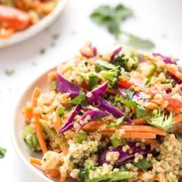 A super simple THAI QUINOA SALAD with all the veggies and a creamy almond butter dressing!