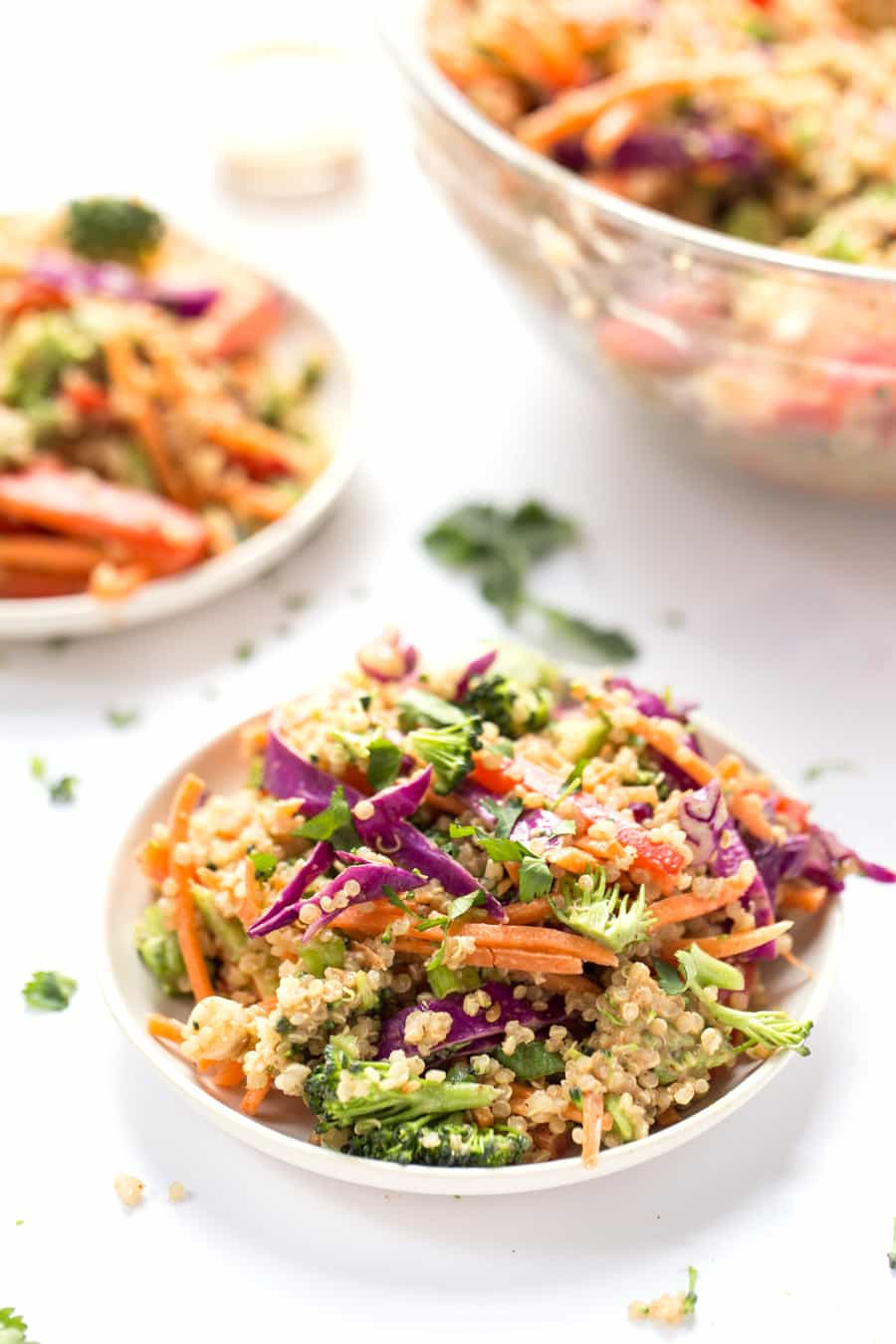 A super simple THAI QUINOA SALAD with all the veggies and a creamy almond butter dressing!