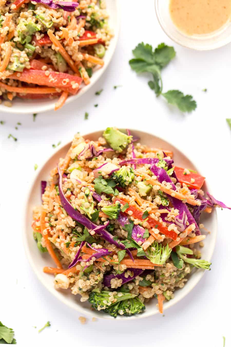 A super simple THAI QUINOA SALAD with all the veggies and a creamy almond butter dressing!