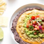 Clean Eating Refried Bean Dip made with five layers of healthy ingredients and 100% gluten-free + vegan too!