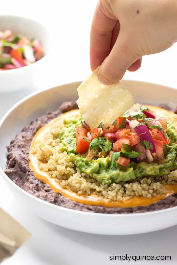 healthy and vegan refried bean dip with vegan queso