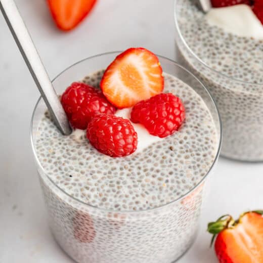 Cup of vanilla chia pudding with fresh berries.