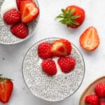 Overhead view of vanilla chia pudding topped with berries and yogurt.