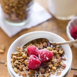 Vegan Coconut Oil Quinoa Granola made with a blend of oats and quinoa flakes, nuts and seeds, and sweetened with maple syrup {gluten-free} || simplyquinoa.com