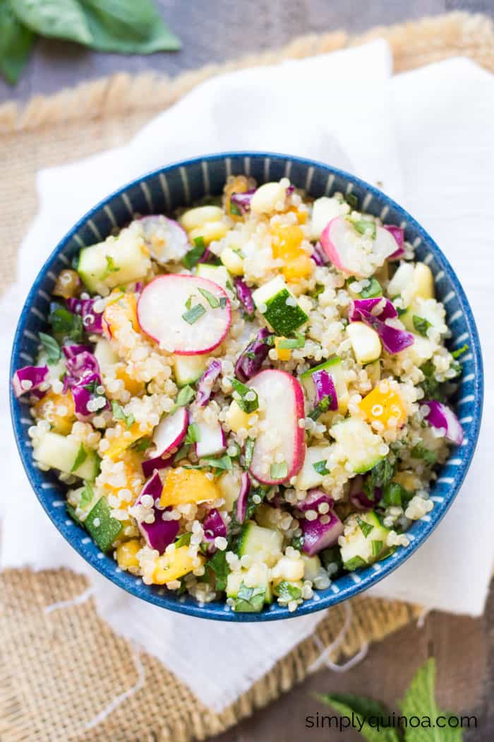 Farmer's Market Quinoa Salad using loads of fresh, seasonal produce, tossed with fresh herbs and a lemon vinaigrette | www.simplyquinoa.com