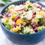 healthy quinoa salad made with veggies from the farmers market