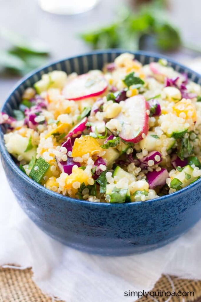 healthy quinoa salad made with veggies from the farmers market