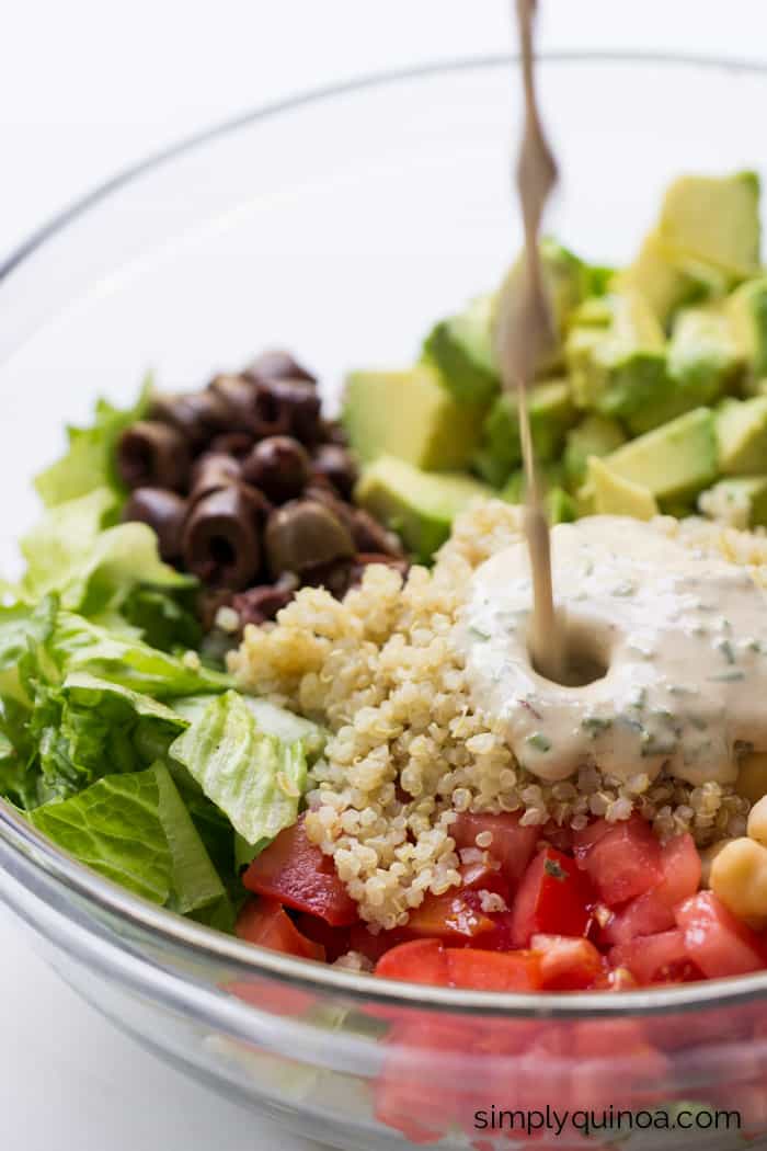 This simple + DELICIOUS chopped quinoa salad is made with tons of veggies and dressed in a tahini-chive dressing | recipe on simplyquinoa.com