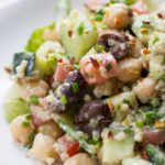 Delicious Chopped Quinoa Salad tossed with a creamy Chive-Tahini Dressing | recipe on simplyquinoa.com