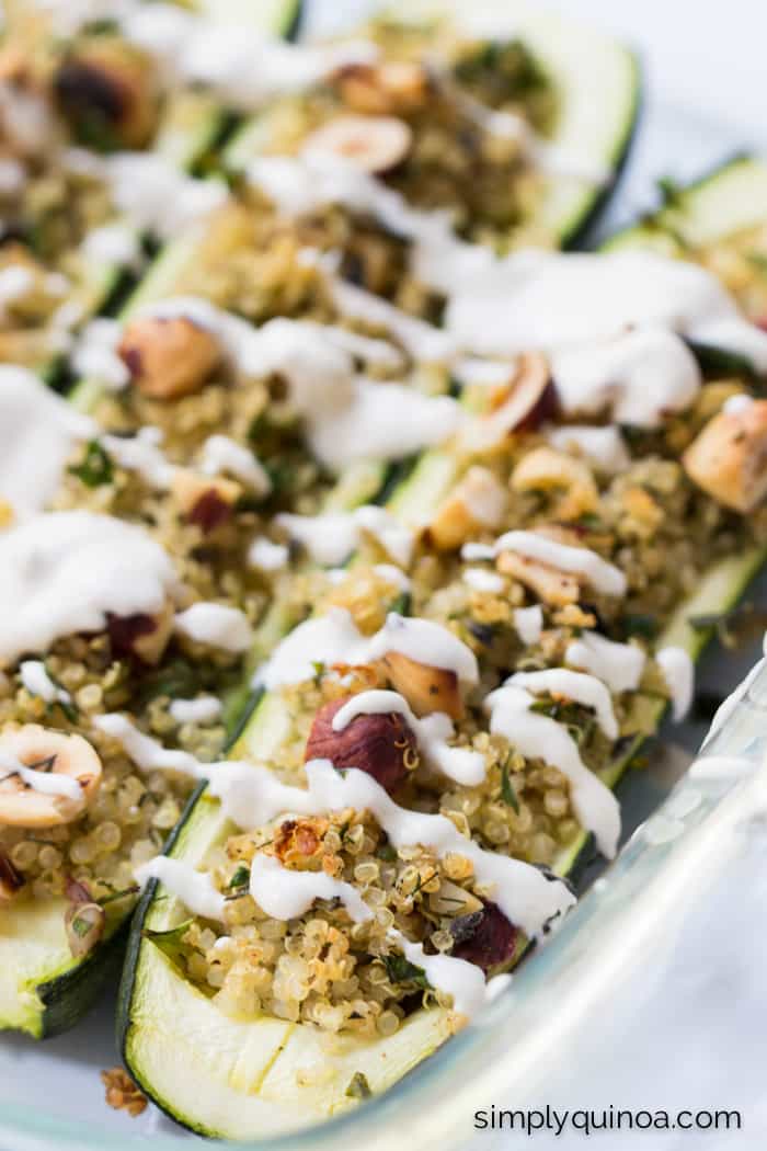 Quinoa Stuffed Zucchini Boats - drizzled in a quick lemon cashew cream sauce | gluten-free + vegan | recipe on simplyquinoa.com