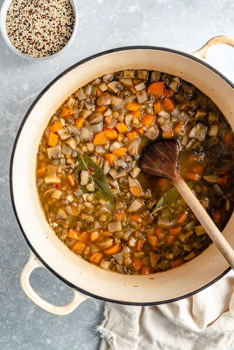 cooking one pot lentils and quinoa in a large dutch oven