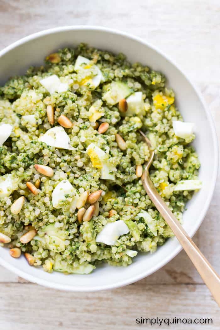 Healthy Savory Quinoa Breakfast Bowls with homemade pesto, soft boiled eggs, avocado and toasted pine nuts | recipe on simplyquinoa.com