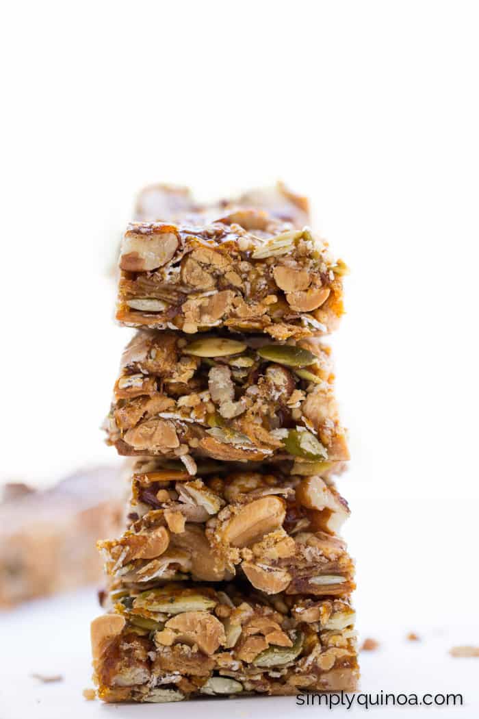 The most AMAZING granola bars ever made with nuts, seeds, coconut, honey and QUINOA. Plus, they're gluten-free + no-bake too!