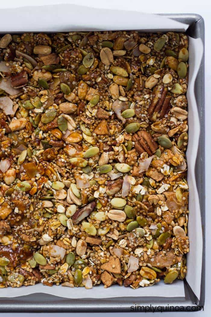 A perfect batch of QUINOA granola bars >> made with a blend of nuts, dried apple and coconut and sweetened with an amazing honey caramel