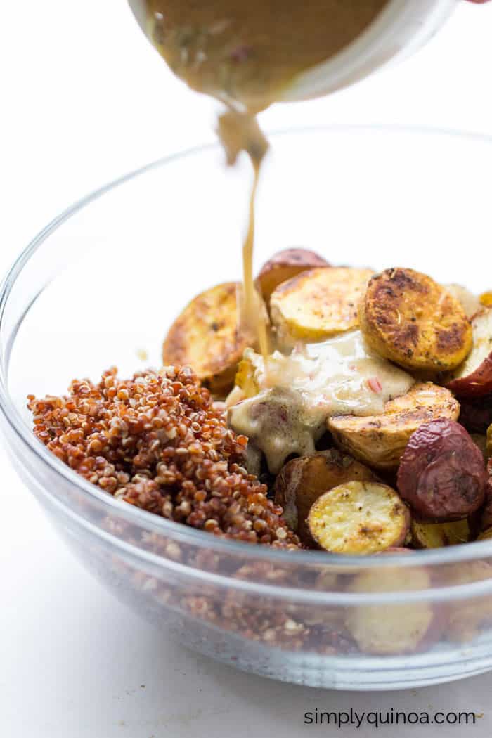 Need to use up some potatoes? Make this AMAZING roasted quinoa and red quinoa salad with a shallot, caper + dijon dressing