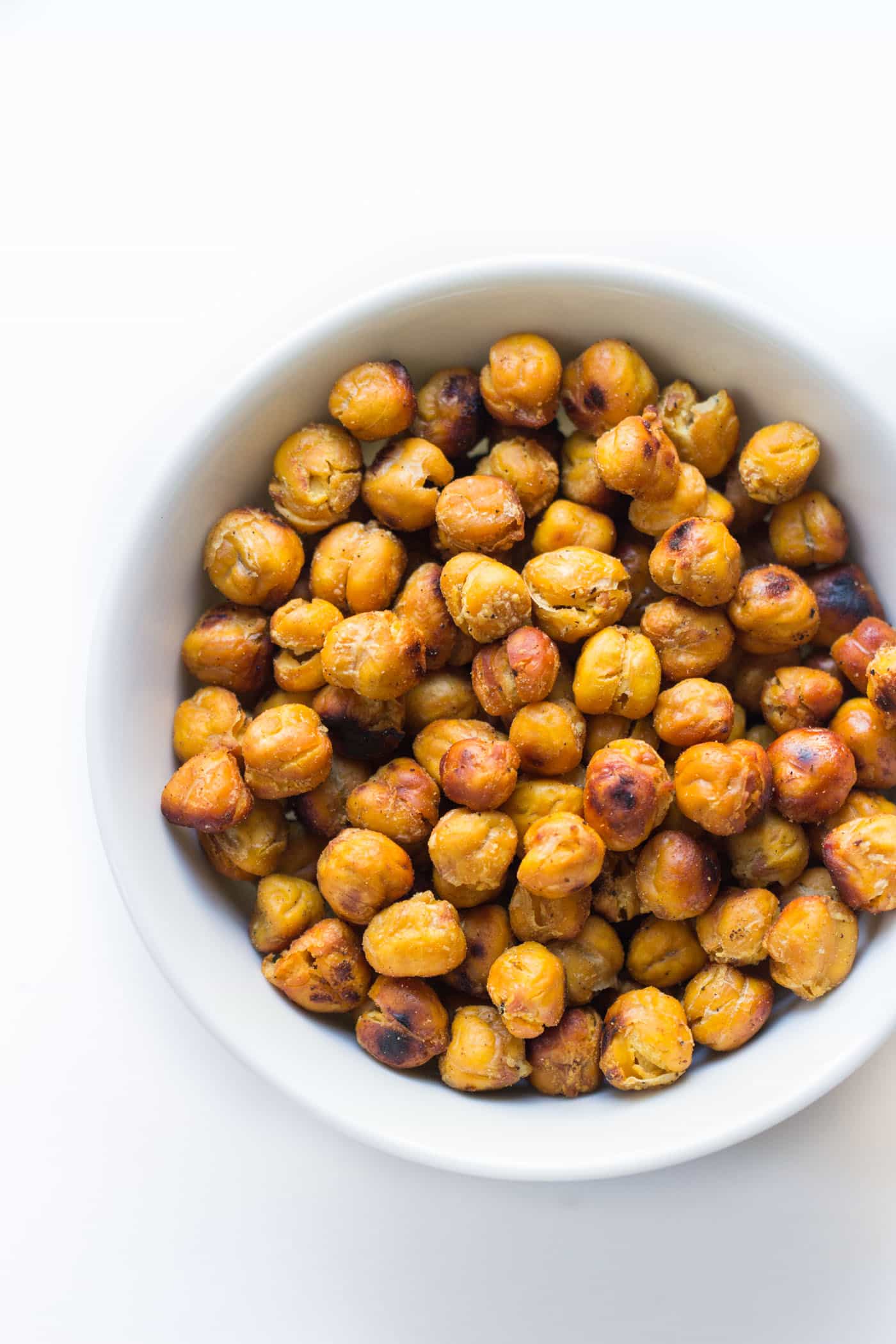 Crispy Garlic Roasted Chickpeas -- awesome on top of salads, soups, as a snack or even on pizza!