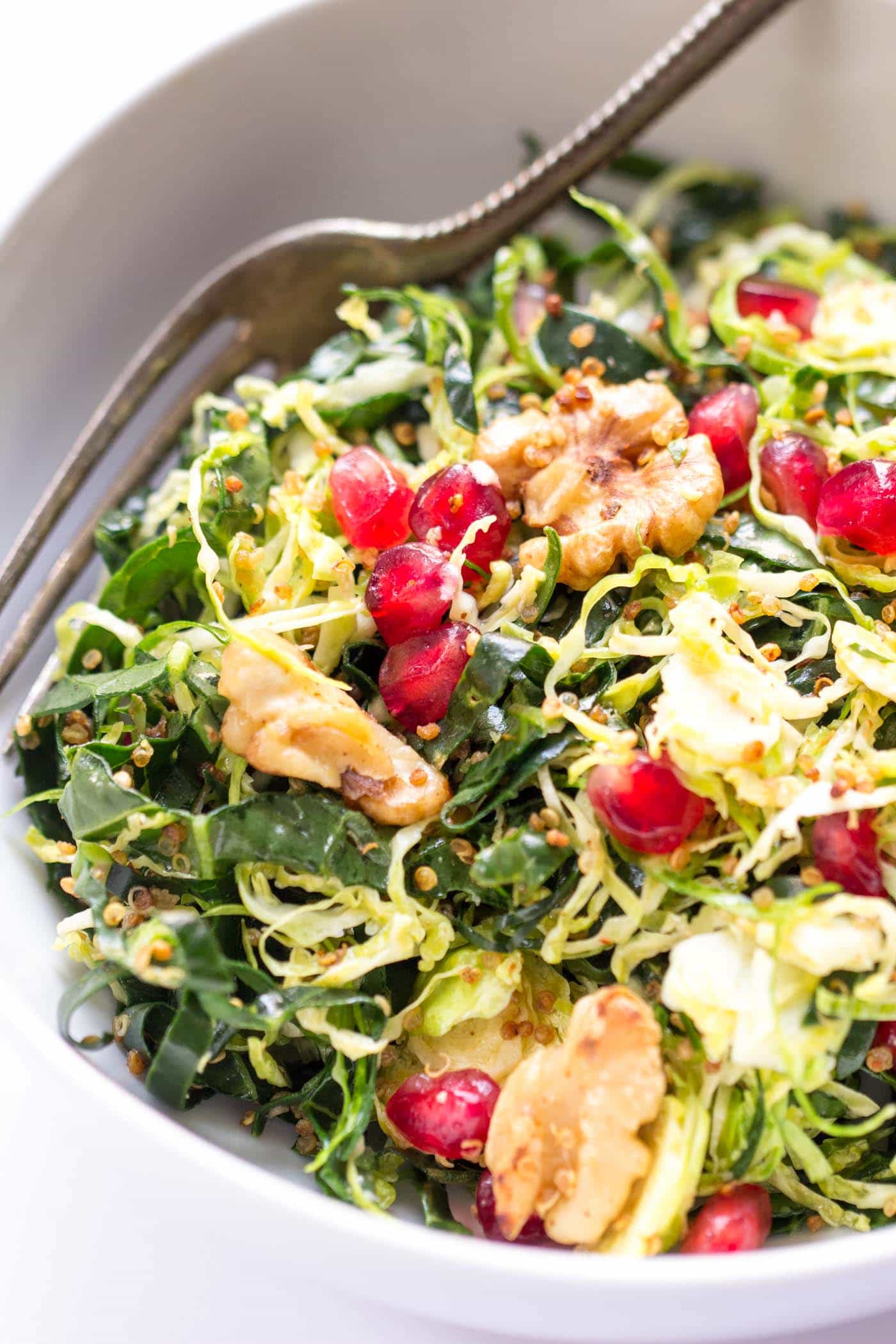 The perfect holiday salad -- Shredded Brussels Sprouts with kale, crispy quinoa, toasted walnuts and pomegranates 