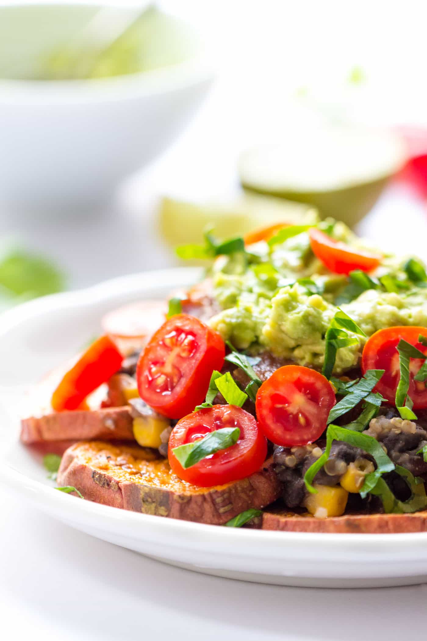 HEALTHY quinoa nachos made with sweet potatoes instead of corn chips -- no cheese or sour cream needed! [vegan + gf]