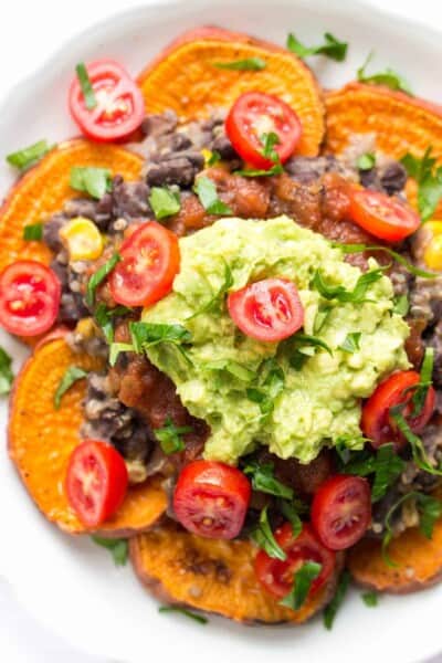 How to make nachos healthy >> swap tortilla chips for sweet potatoes! These quinoa nachos are the bomb!