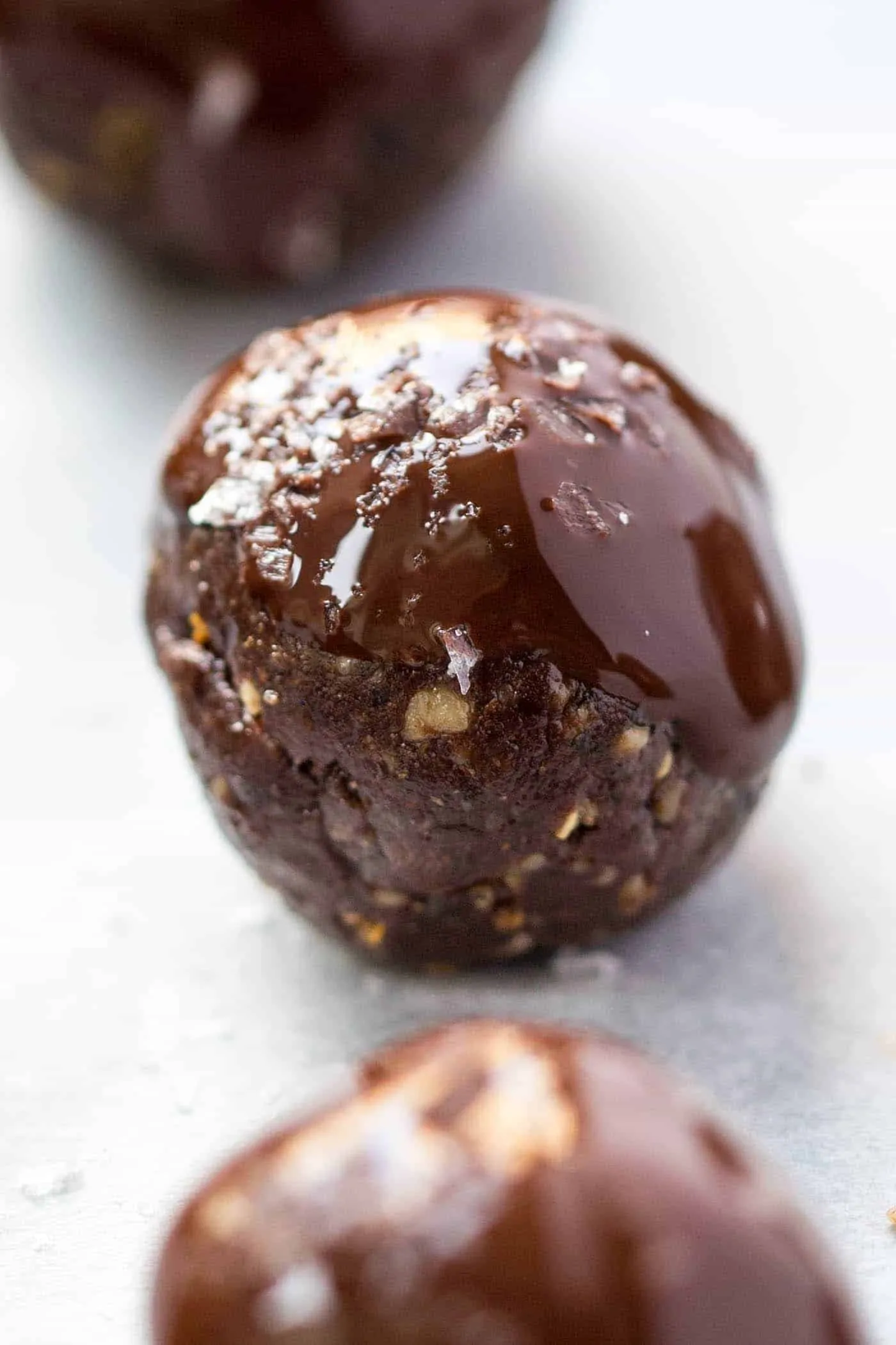 Sea Salt + Dark Chocolate Quinoa Energy Balls -- a quick, nutritious and indulgent snack (or dessert) that you don't have to feel guilty about!