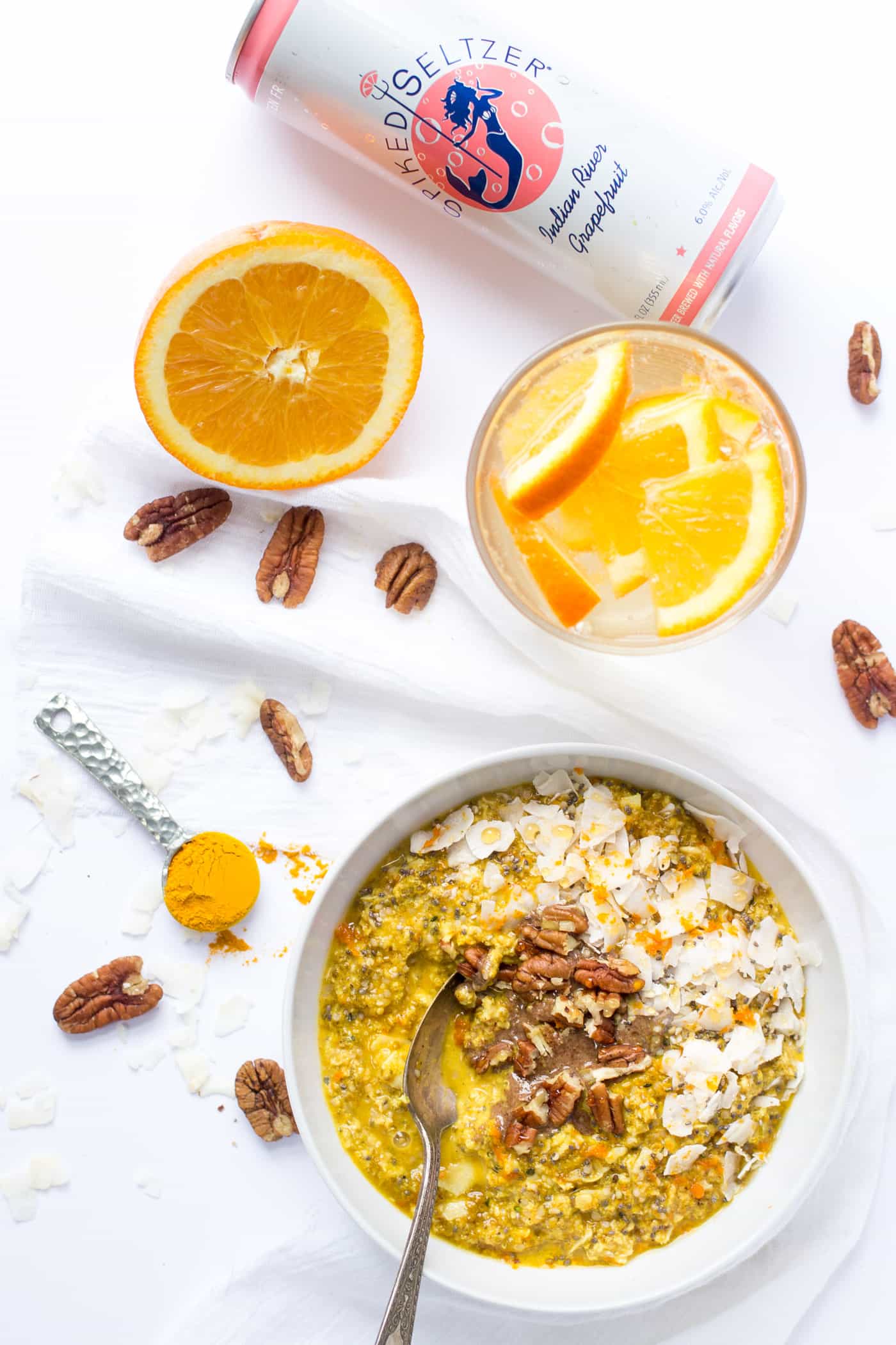 The ultimate brunch -- Orange Turmeric Overnight Quinoa with a SpikedSeltzer on the side (gf + vegan)